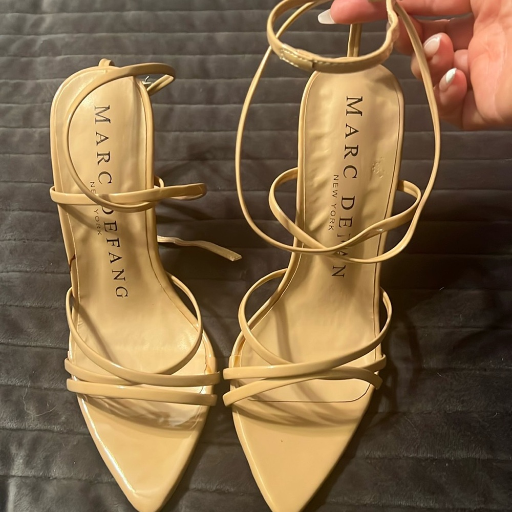 A pair of women’s size 7.5 Marc Defang heels.
